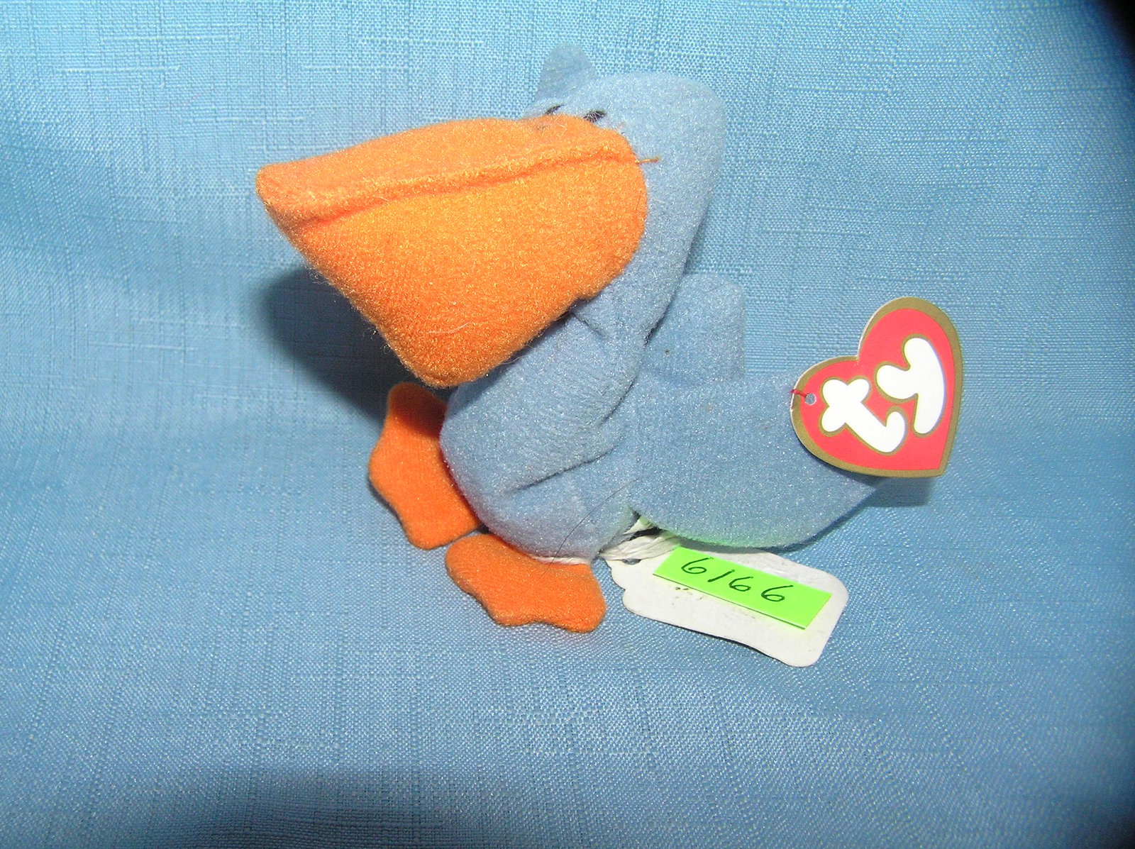 Vintage Scoop the pelican Beanie Baby toy: Vintage Scoop the pelican Beanie Baby toy est. value $25.00-$30.00