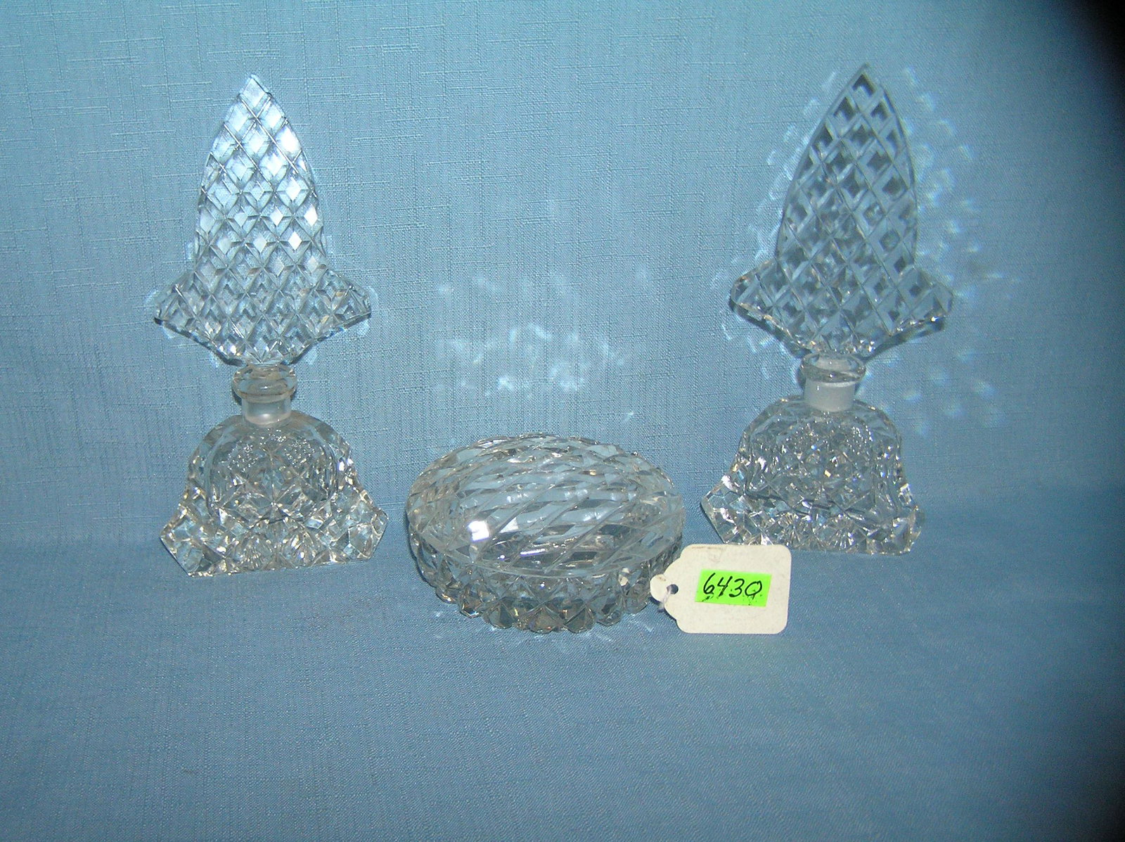 Crystal vanity set: Crystal vanity set includes powder/trinket box and 2 perfume dabbers, 1 dabber condition as found broke and stuck in bottle est. value $40.00-$50.00