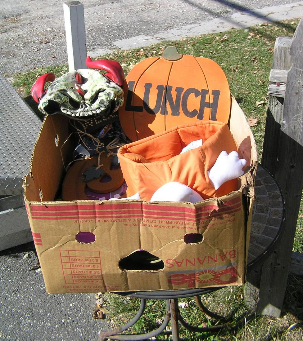 Large box full of vintage Halloween collectibles: Large box full of vintage Halloween collectibles includes outfits, decorations and more est. value $100.00-$125.00