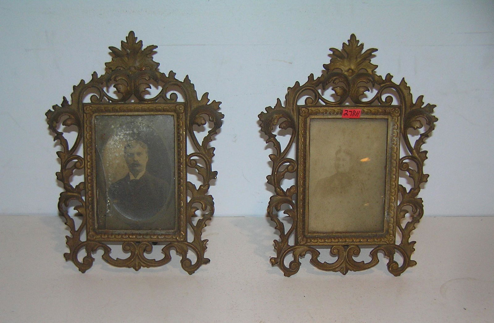 Antique bronze picture frames with antique photos: Pair of antique bronze picture frames with 2 early antique portrait photos condition as found est. value $175.00-$200.00
