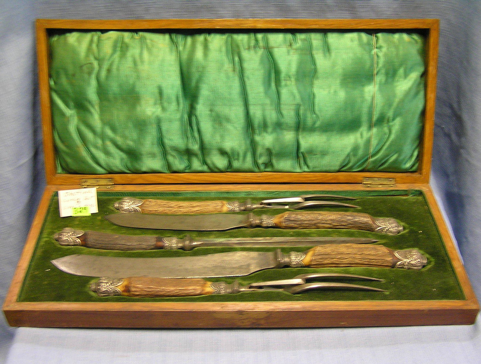 Antique Sheffield bone handled carving set: Antique Sheffield bone handled carving set with silver highlights in original antique oak box est. value $650.00-$750.00