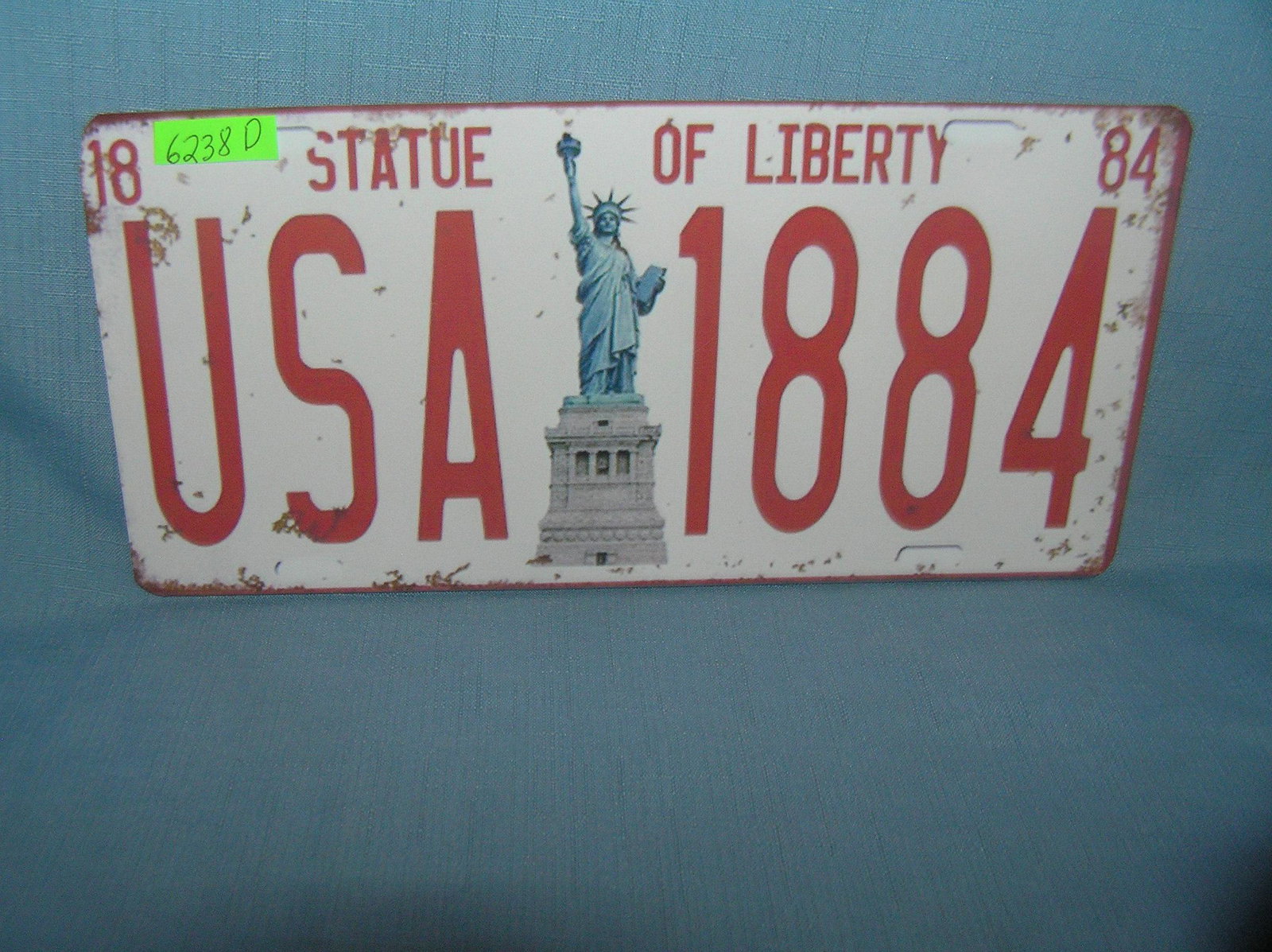 Statue of Liberty USA License plate size sign: Statue of Liberty USA License plate size wall or car advertising sign est. value $25.00-$30.00