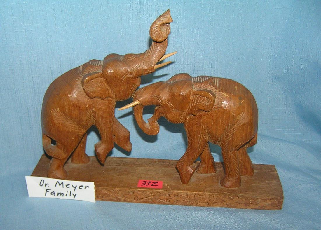 Hand carved elephant's at play wooden figural display: Hand carved elephant's at play wooden figural display piece all hand carved hard wood from the Dr. Meyer estate est. value $75.00-100.00