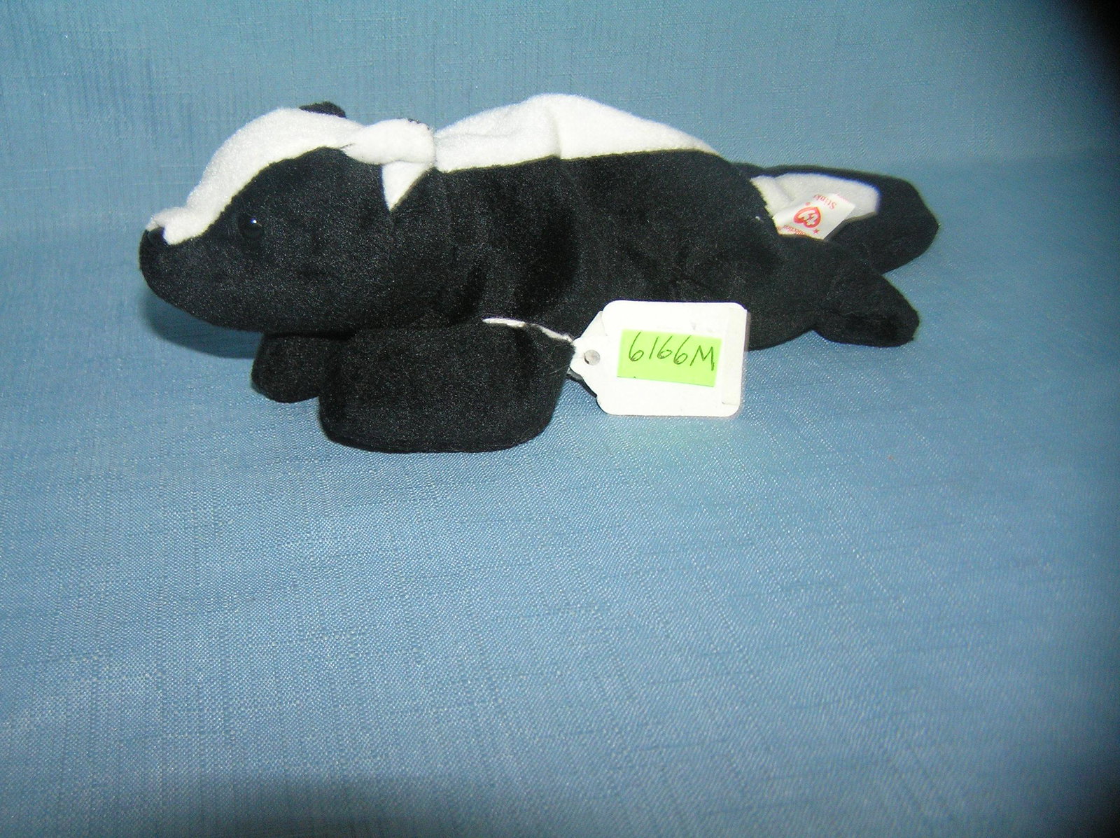 Vintage Stinky the skunk Beanie Baby toy: Vintage Stinky the skunk Beanie Baby toy est. value $25.00-$30.00