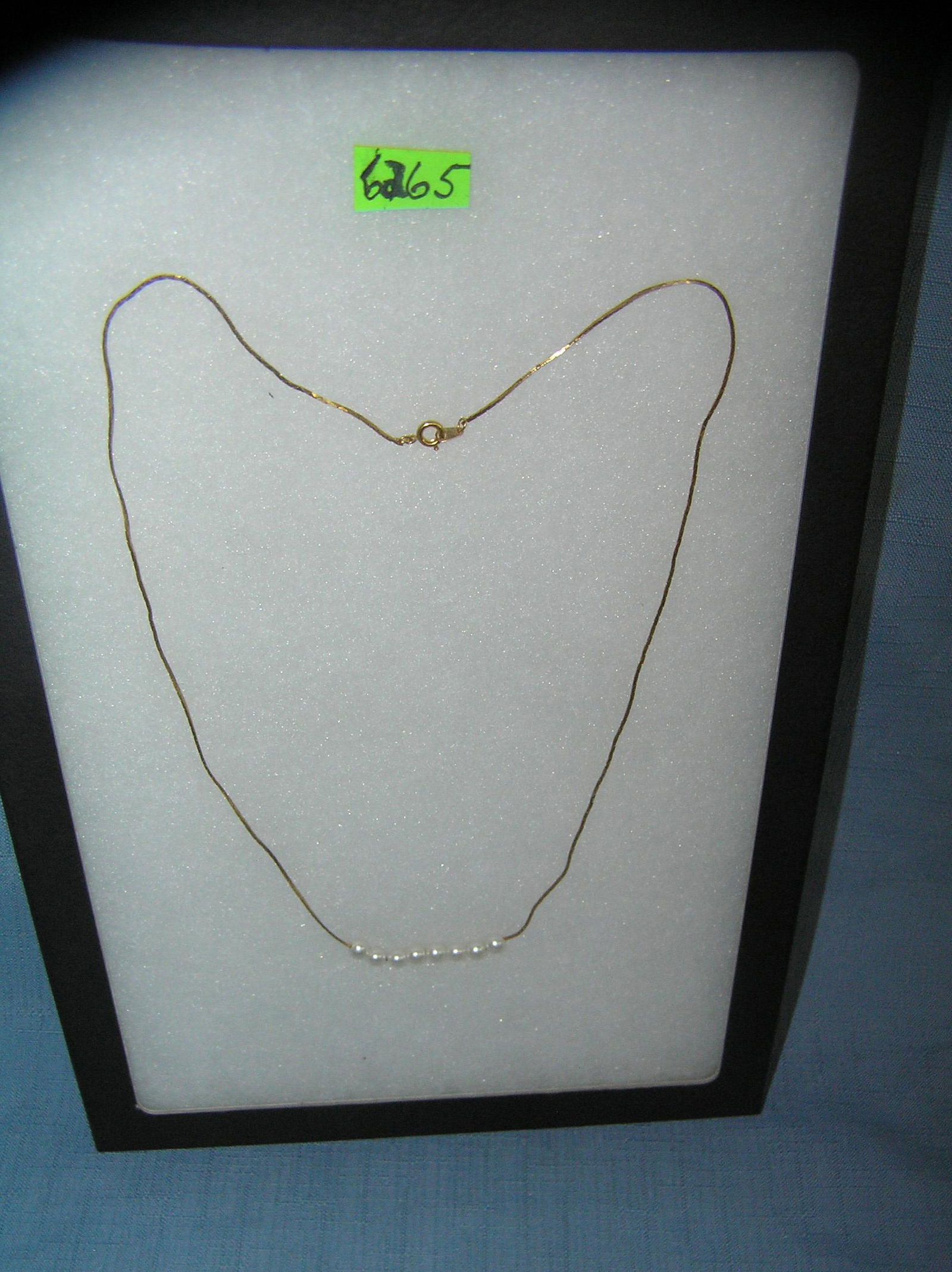 Gold tone and pearl necklace: Gold tone and pearl necklace est. value $30.00-$35.00