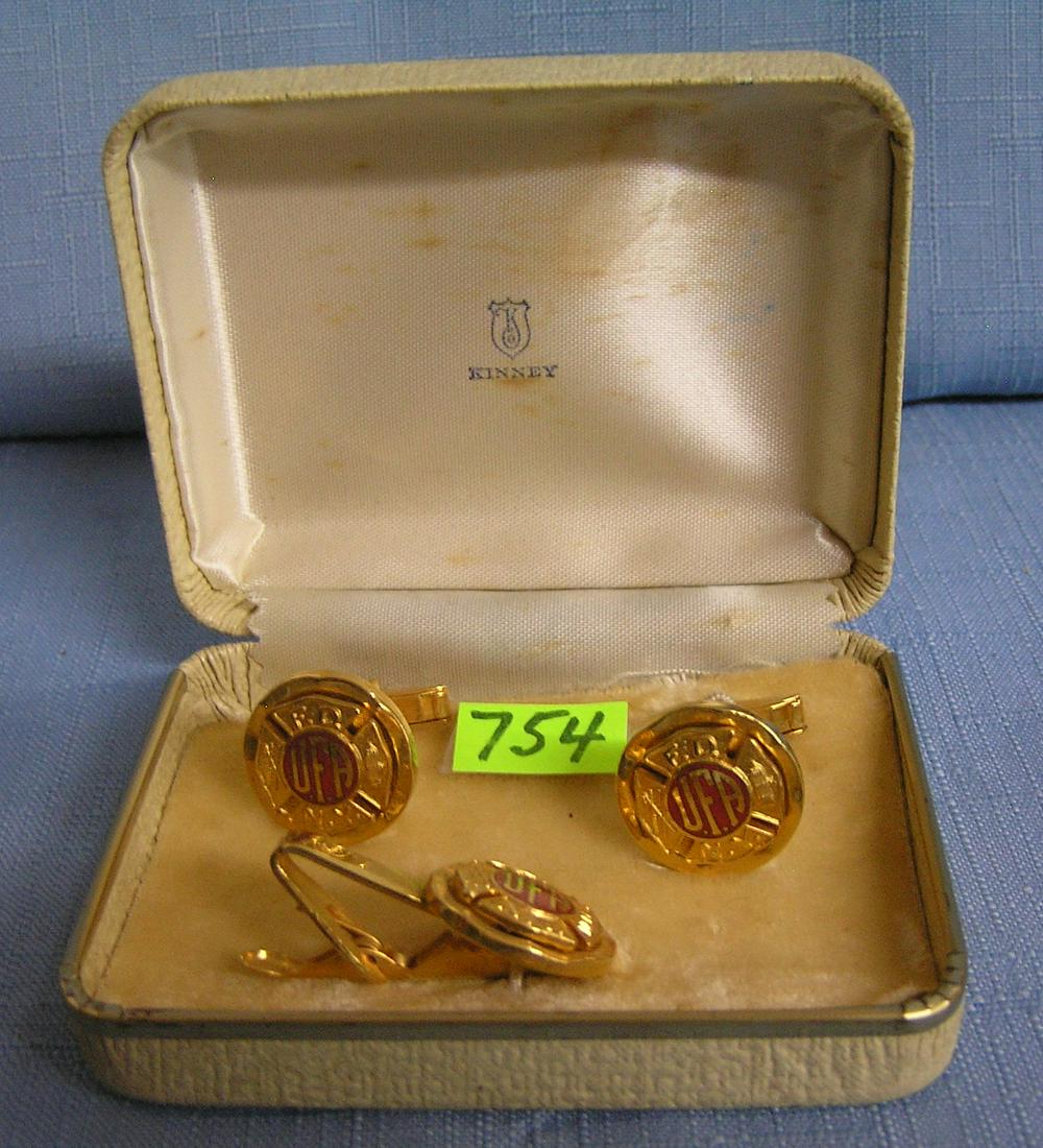 Set of quality fireman cuff links and tie clasps: Set of high quality gold plated fireman’s cuff links and tie clasps set with original box est. value $65.00-$75.00