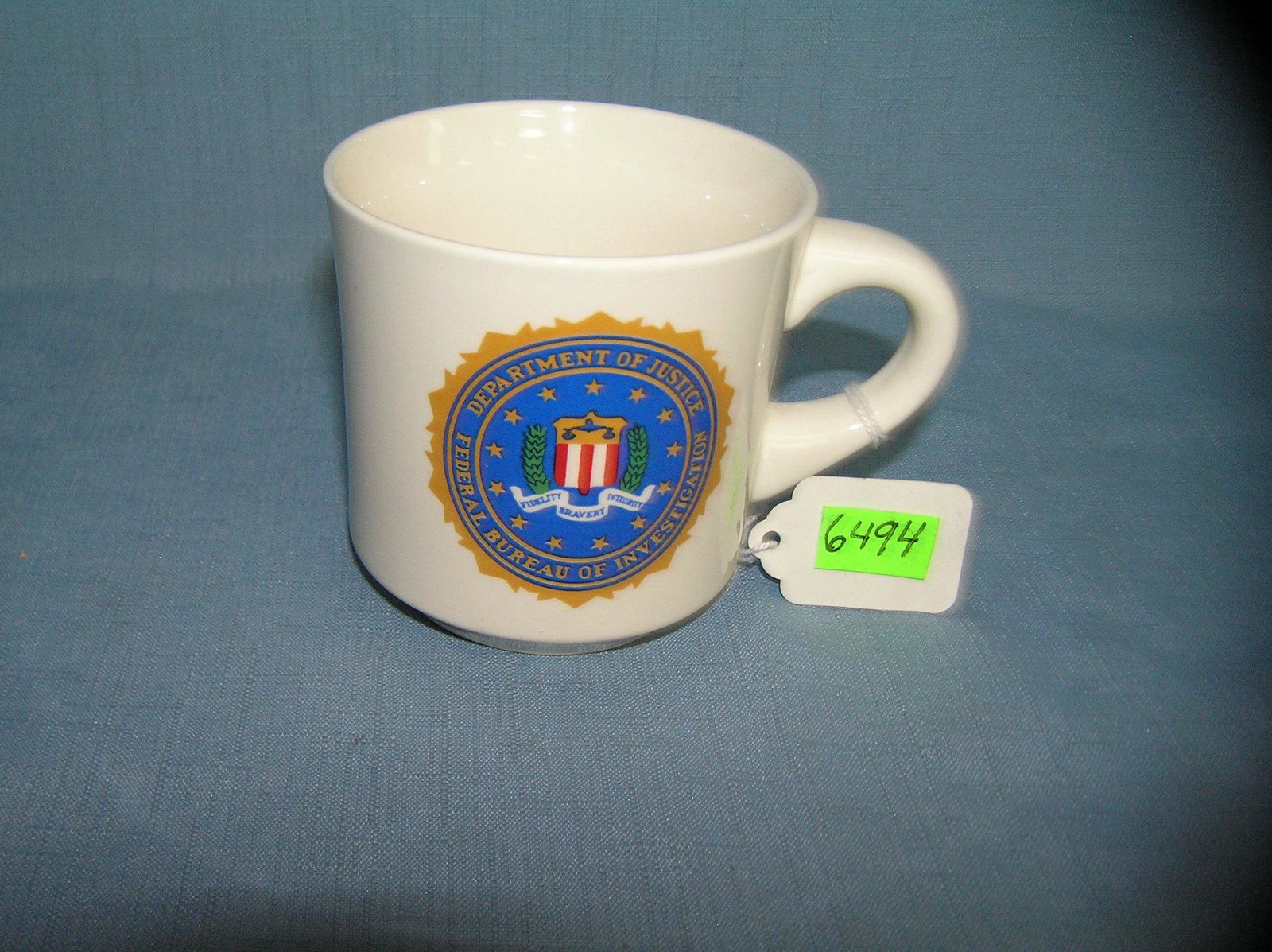 Vintage FBI agents coffee mug: Vintage FBI agents coffee mug est. value $25.00-$30.00