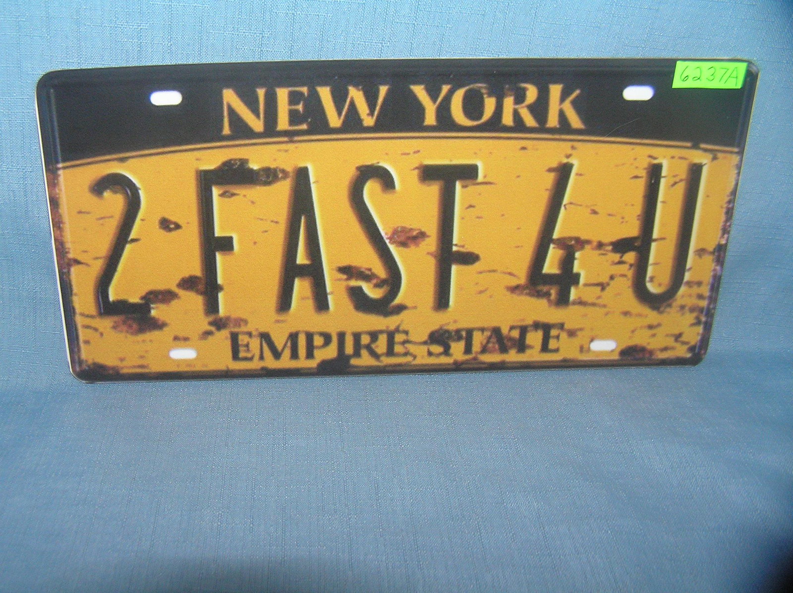 2 fast 4 U License plate size wall or car advertising: 2 fast 4 U License plate size wall or car advertising sign est. value $25.00-$30.00
