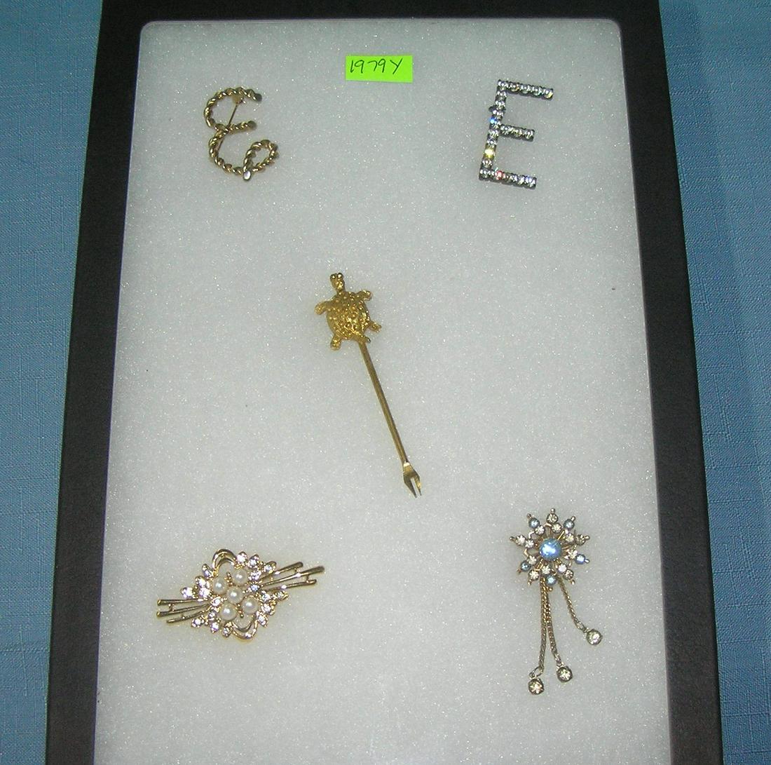 Group of quality costume jewelry pins: Group of quality costume jewelry pins includes Coro, Emmons and more est. value $40.00-$50.00