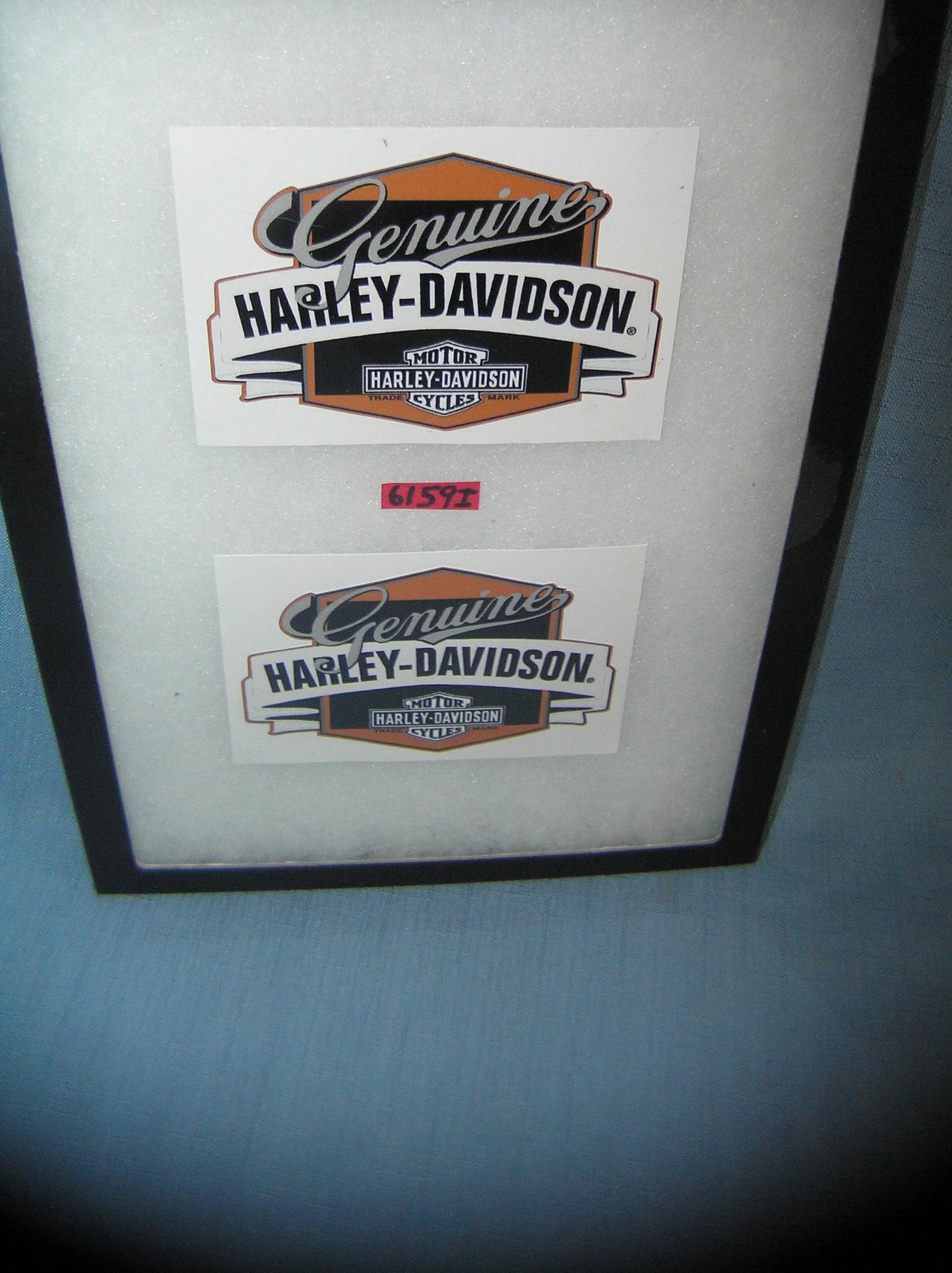 Pair of Harley Davidson advertising stickers: Pair of Harley Davidson 3 1/2 inches by 4 1/2 inches stickers advertising promotional stickers est. value $15.00-$20.00