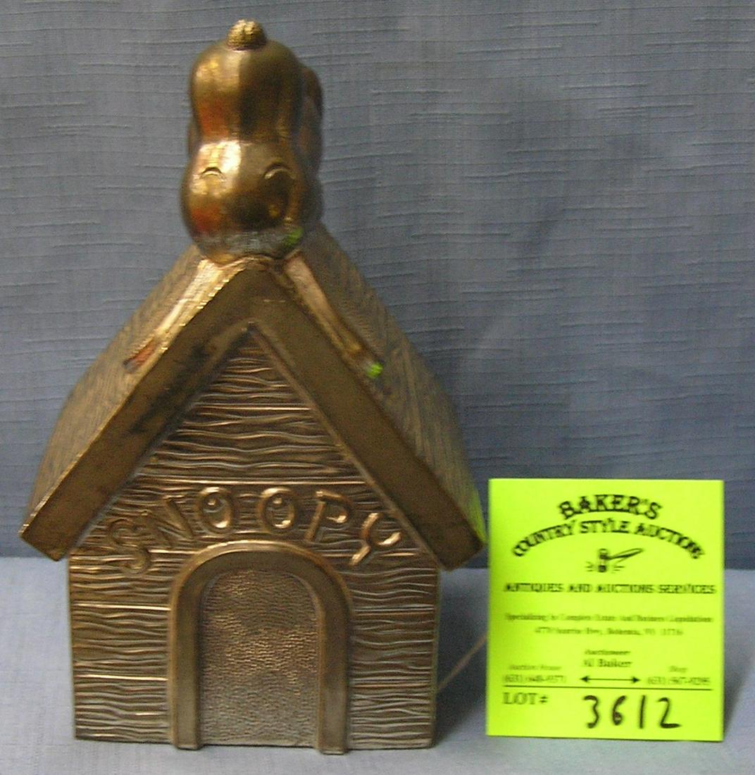 Vintage cast metal Snoopy bank: Vintage cast metal Snoopy bank est. value $75.00-$100.00