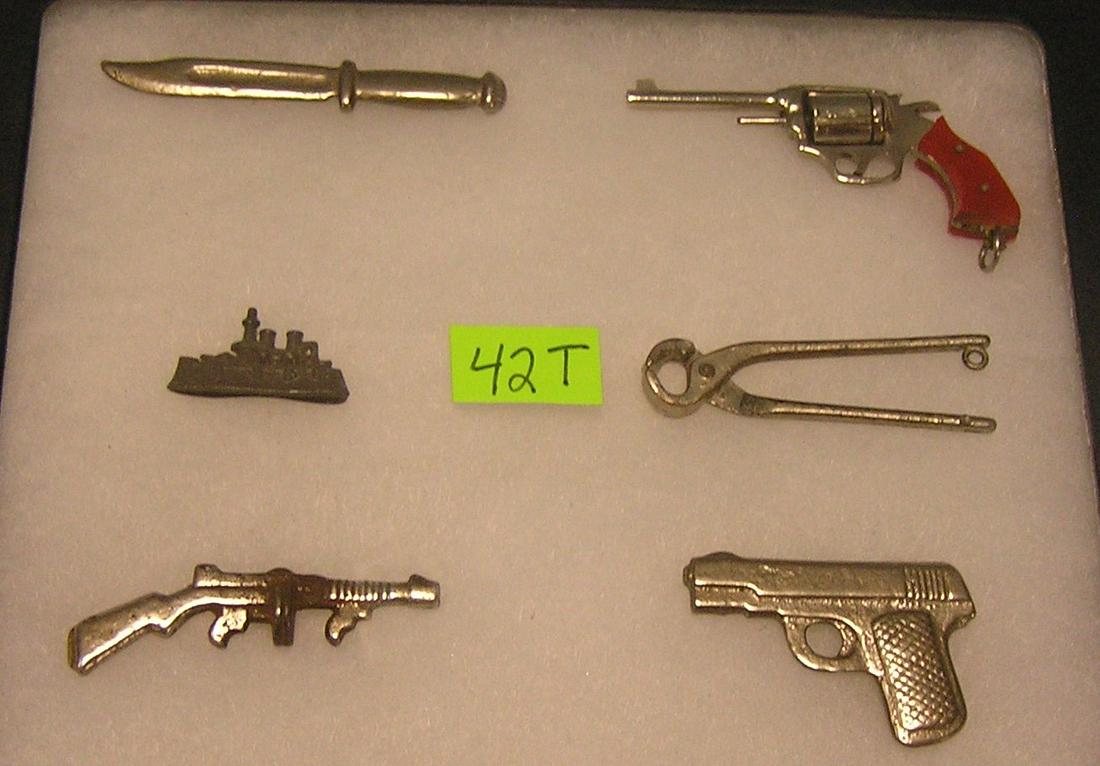 Miniature weapons, tools and more: Group of great early metal miniature weapons, tools and more est. value $150.00-$200.00