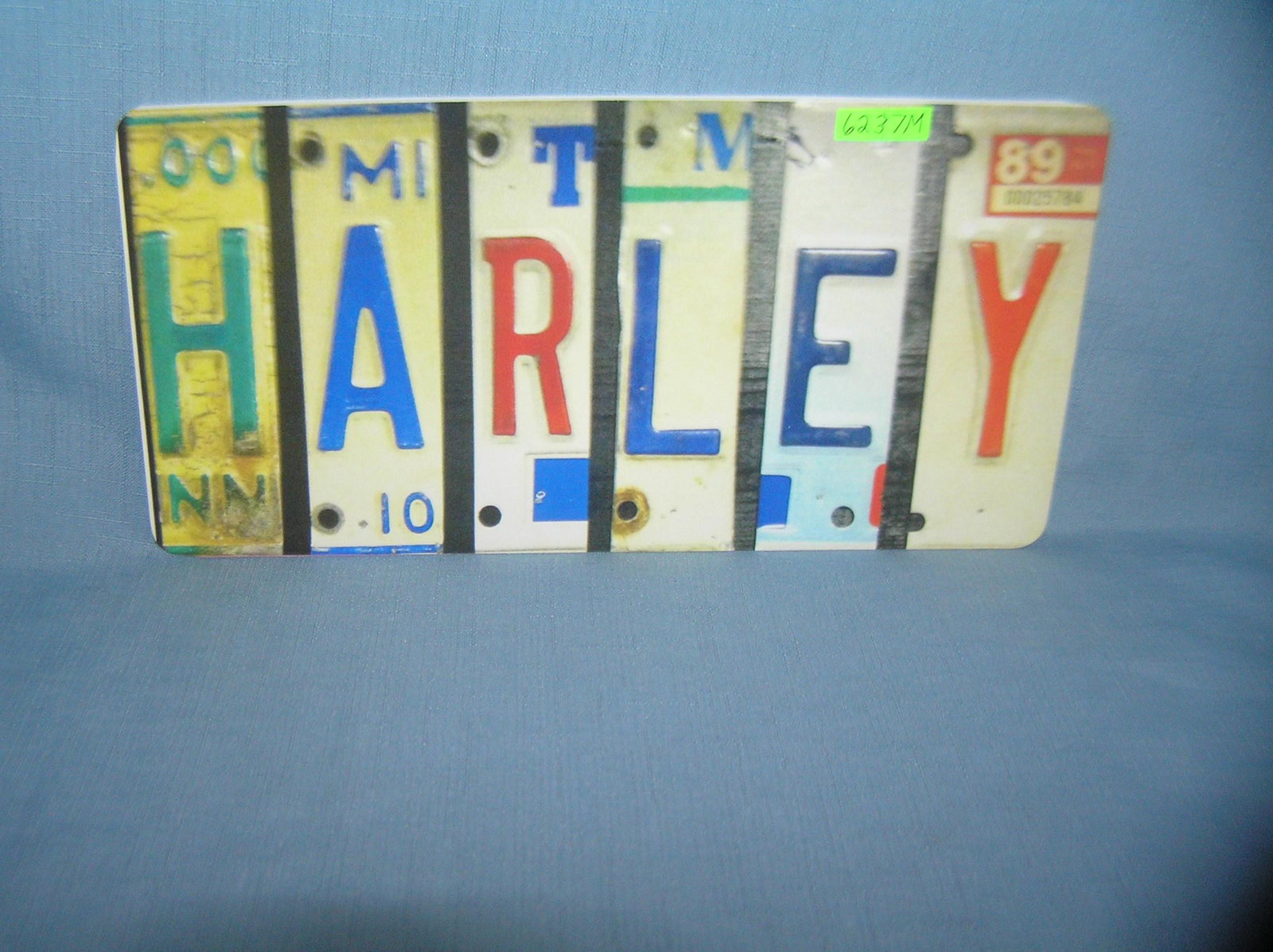 Harley License plate size wall or car advertising sign: Harley License plate size wall or car advertising sign est. value $25.00-$30.00