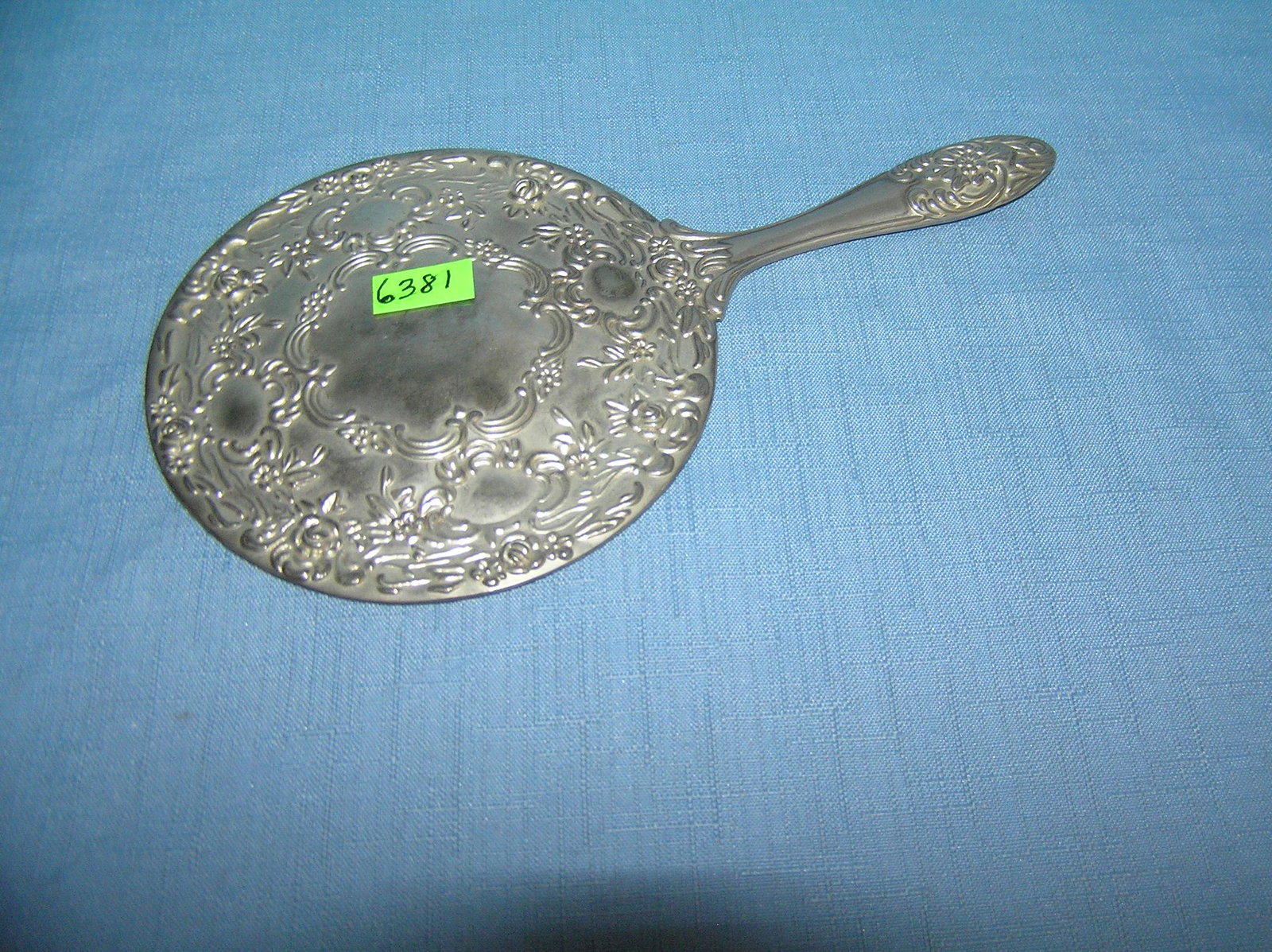 Vintage silver plated vanity mirror: Vintage silver plated vanity mirror est. value $30.00-$50.00