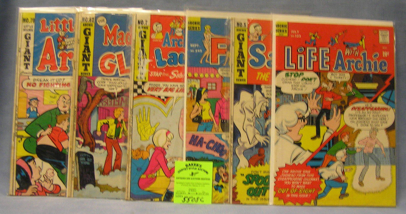 Group of 6 vintage Archie comic books: Group of 6 vintage Archie comic books featuring Life with Archie, Sabrina, Pep, Mad House Glad and more est. value est. value $40.00-$50.00