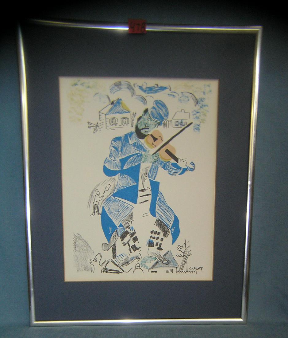 Marc Chagall print of Fiddler on the Roof: Marc Chagall matted and framed print of Fiddler on the Roof, signiture on lower right corner matted and framed with no glass est. value $250.00-$300.00