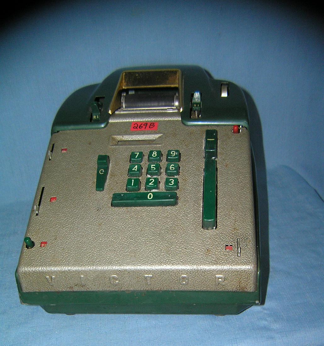 Great early Victor adding machine: Great early Victor adding machine brass, metal and Bakelite constuction made by the Victor Adding Machine Co. Chicago IL est. value $200.00-$225.00