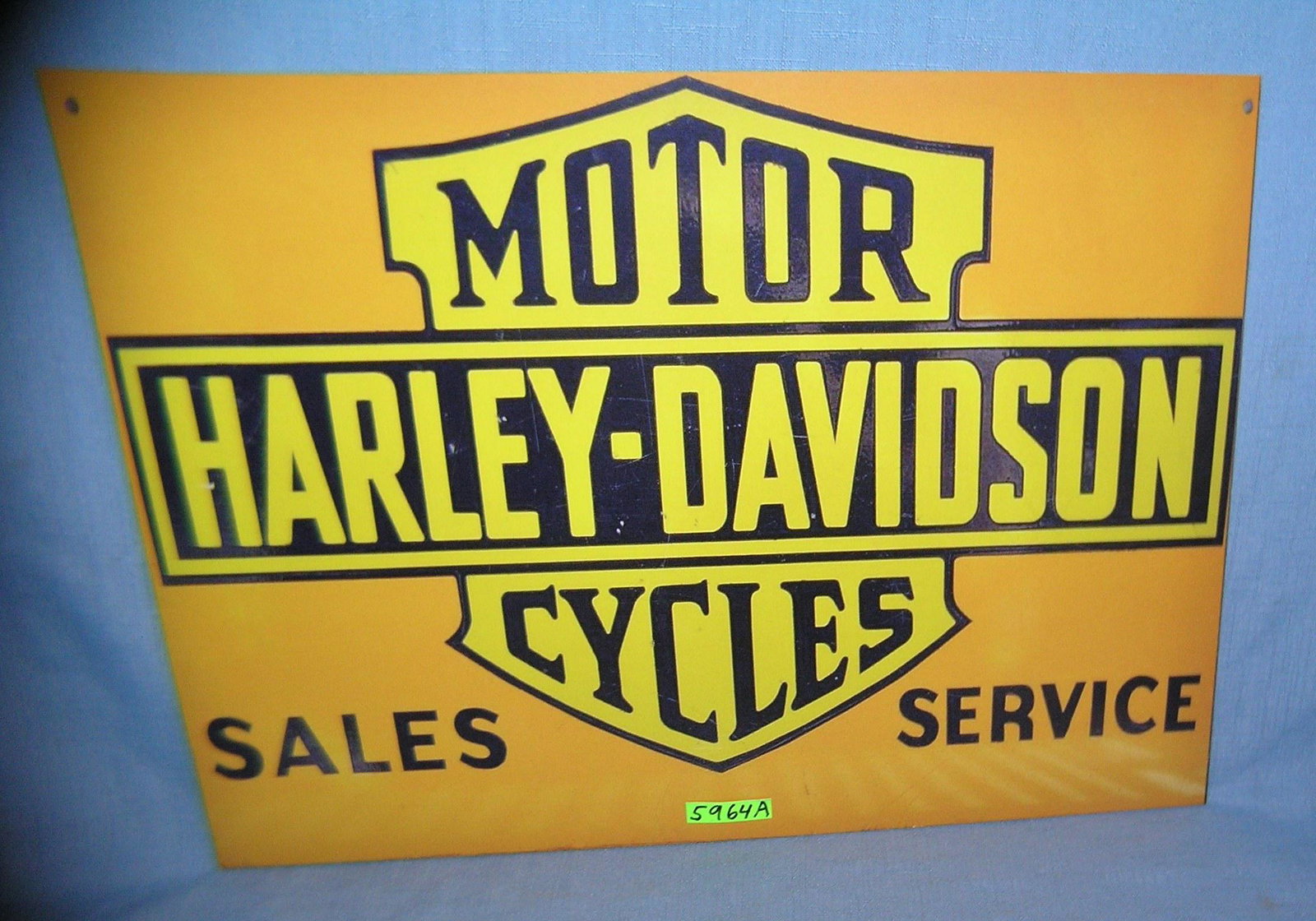 Harley Davidson motorcycle retro style advertising sign: Harley Davidson motorcycle sales and service retro style advertising sign est. value $50.00-$65.00