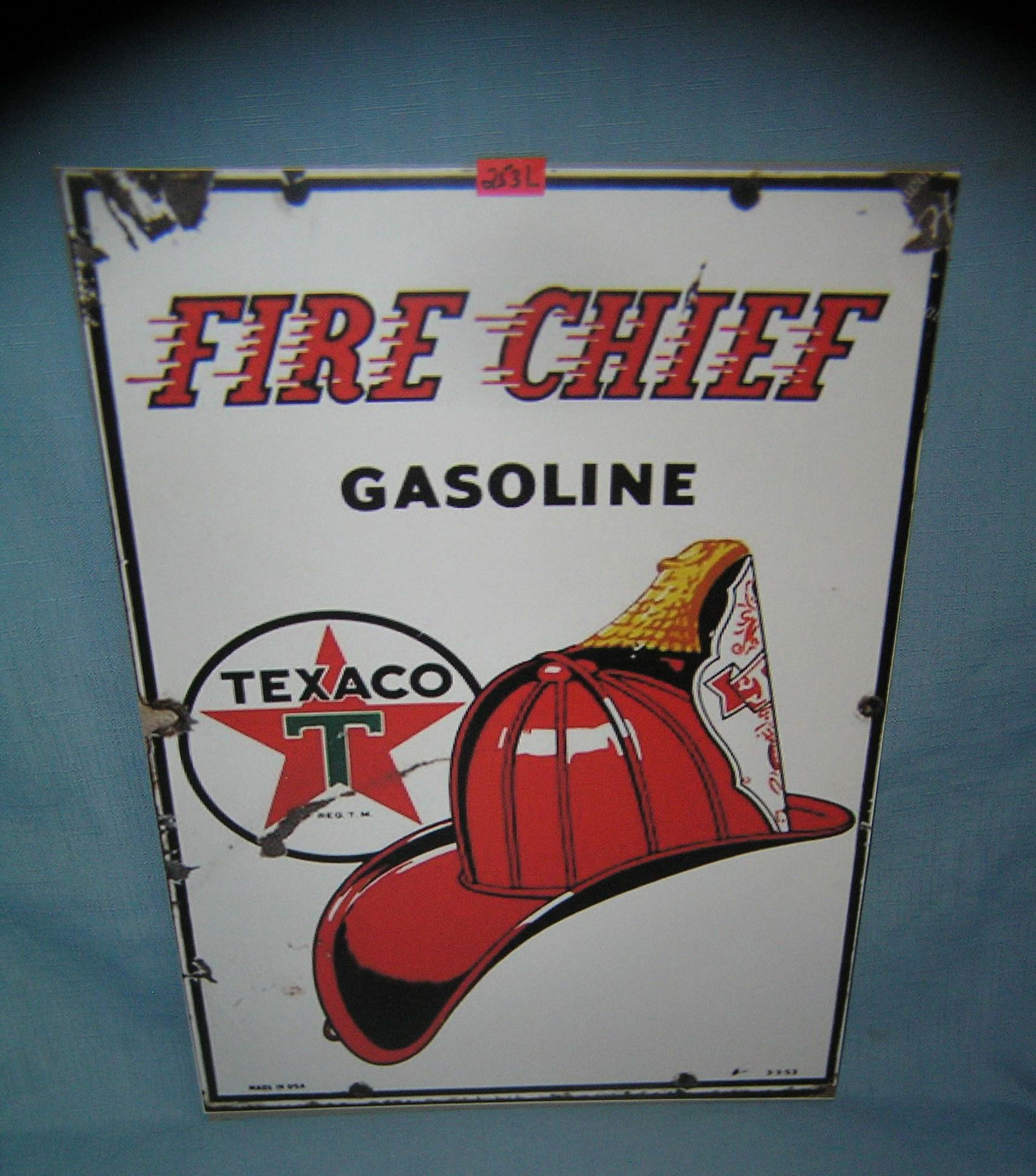 Texaco fire chief gasoline retro style advertising sign: Texaco fire chief gasoline retro style advertising sign 12 inches by 16 inches on board est. value $40.00-$50.00