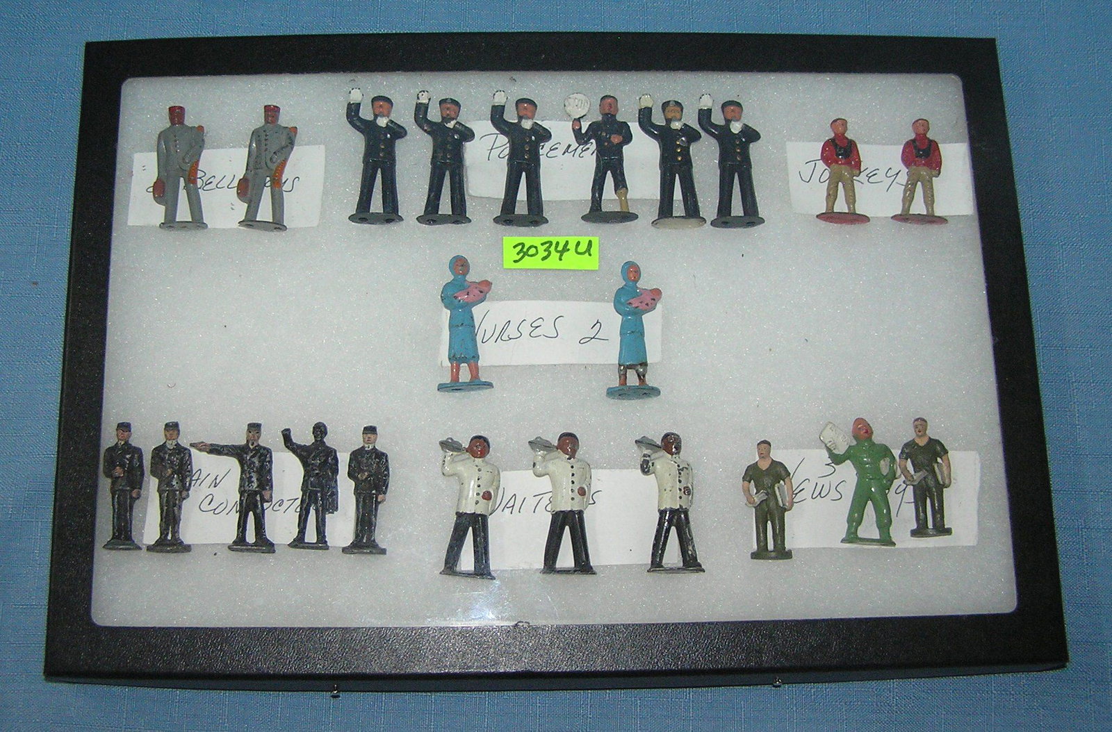 Collection of hand painted lead figures: Collection of hand painted lead figures includes bell hops, police, jockey, nurses, train conductors, waiters and news boys est. value $150.00-$200.00