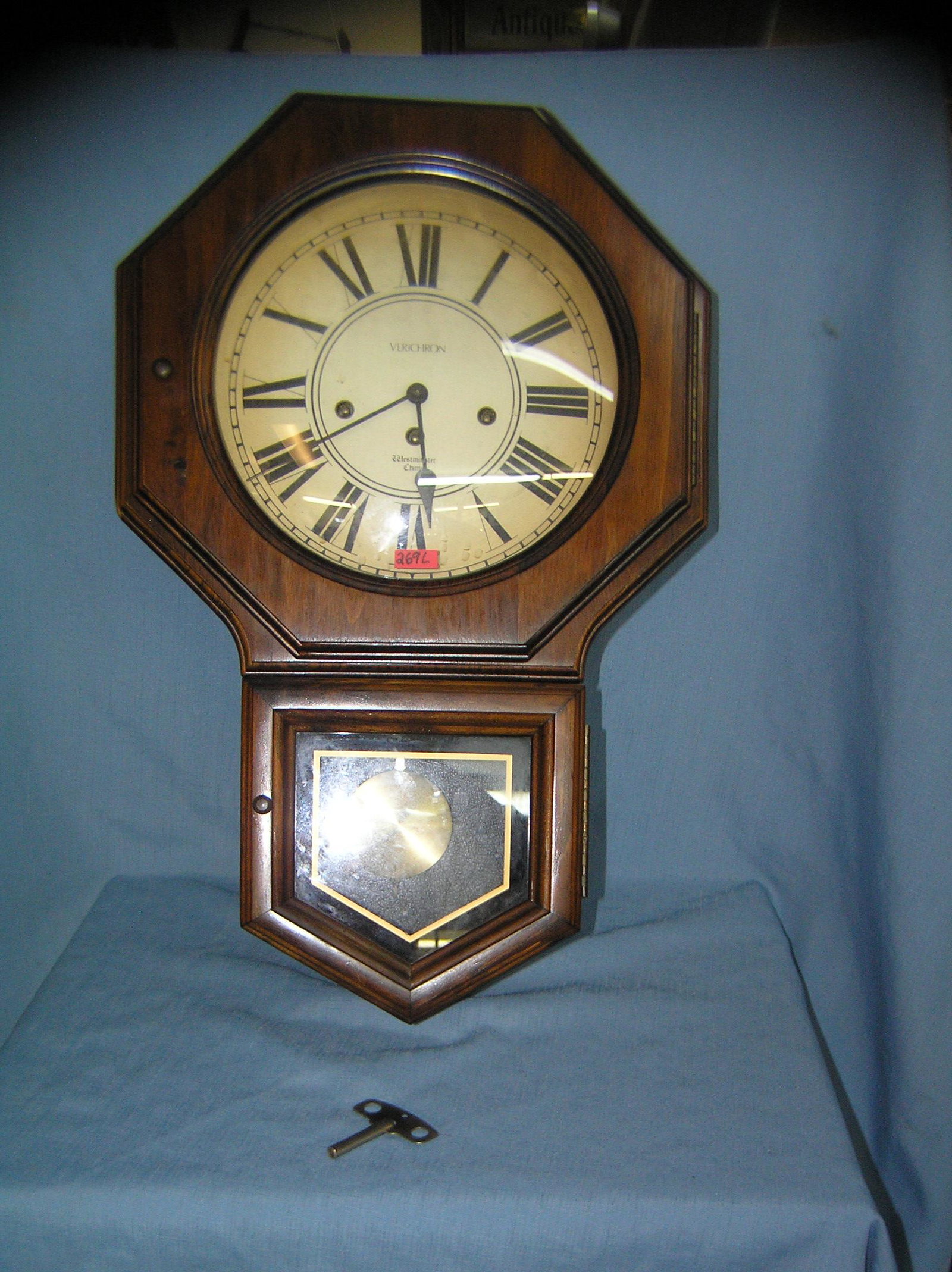 Verichron windup wall clock: Verichron windup wall clock with Westminster chimes American made with original key est. value $200.00-$250.00