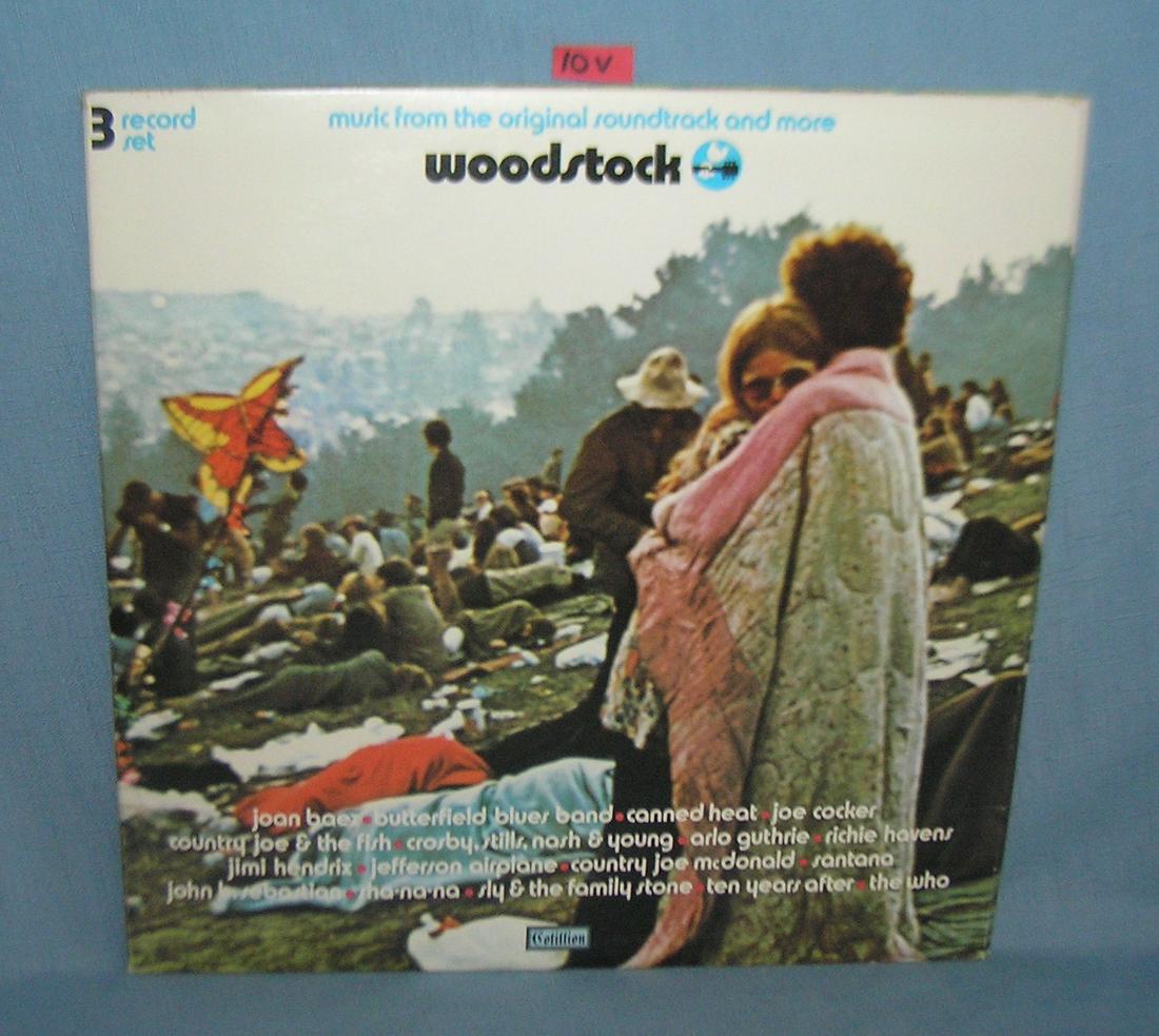Vintage Woodstock 3 record album set: Vintage Woodstock 3 record album set complete with all 3 sleeves. This 3 piece record set is in mint condition and has seen slight to no play time at all, jacket is near mint to mint plus est. value $