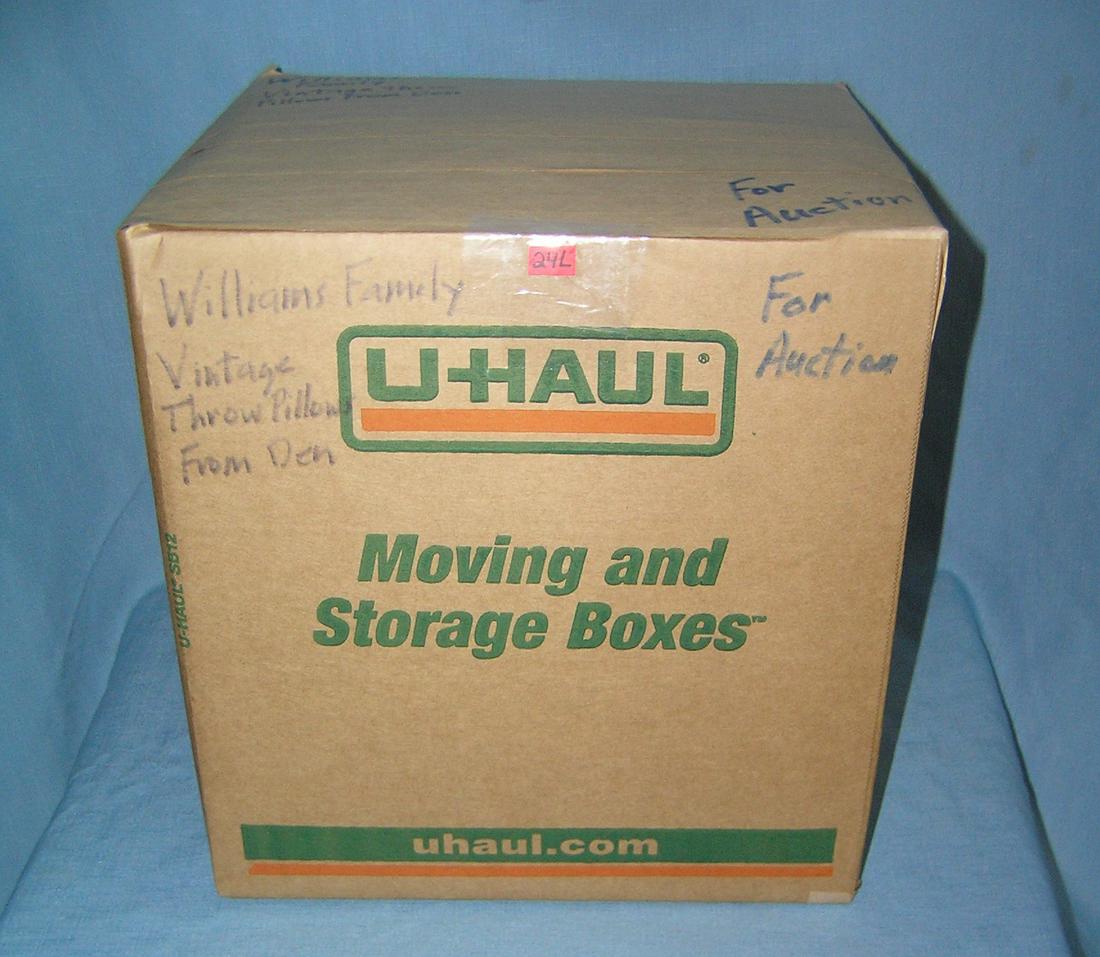 Mystery box lot marked William's family vintage throw: Mystery moving and storage Co. box lot marked William's family vintage throw pillows part of a moving and storage company seized or unclaimed merchandise group sent to auction for liquidation est. val