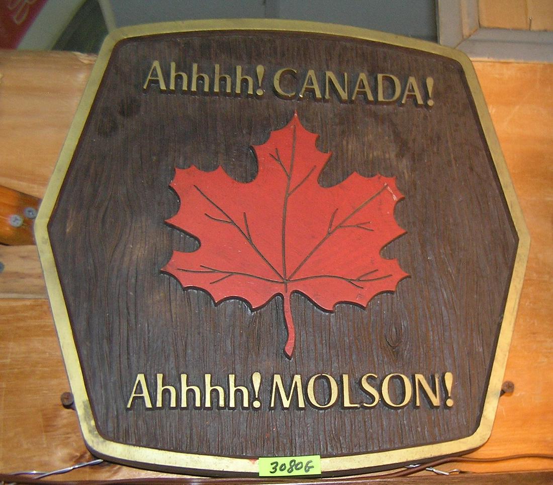 Molson Canadian Beer advertising wall sign: Vintage Molson Canadian Beer advertising wall sign est. value $80.00-$100.00