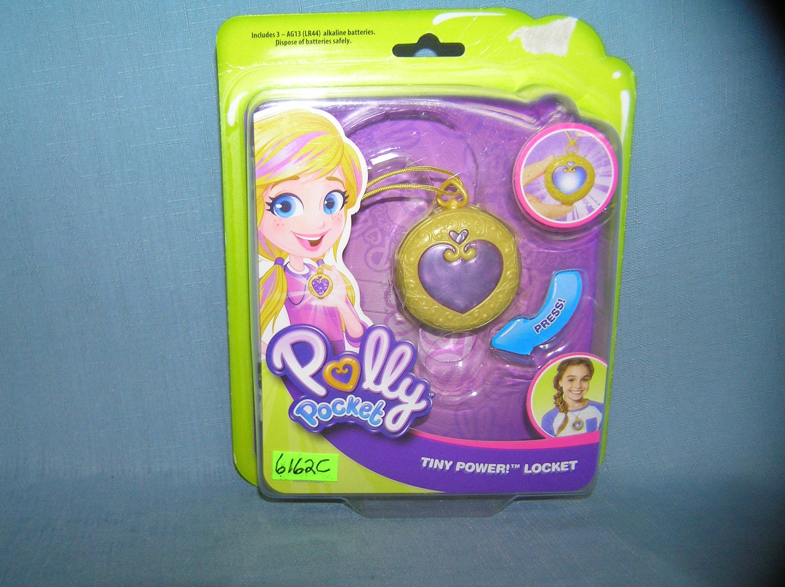 Polly pocket locket necklace: Polly pocket locket necklace est. value $20.00-$25.00
