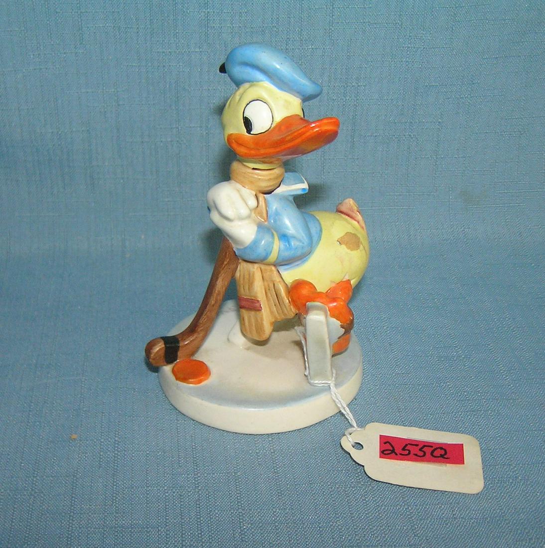 Early Donald Duck playing hockey hand painted figurine: Early Donald Duck playing hockey hand painted figurine Goebel of Germany circa 1940's est. value $250.00-$275.00
