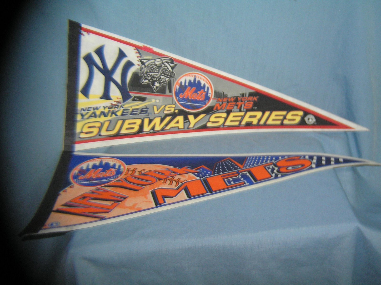 NY Mets felt pennants includes The Subway Series: Pair of NY Mets felt pennants includes The Subway Series with the Yankees est. value $40.00--$50.00