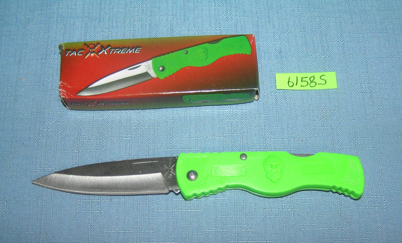 Tactical Green Zombie pocket knife with box: Tactical Green Zombie pocket knife with box est. value $25.00-$30.00