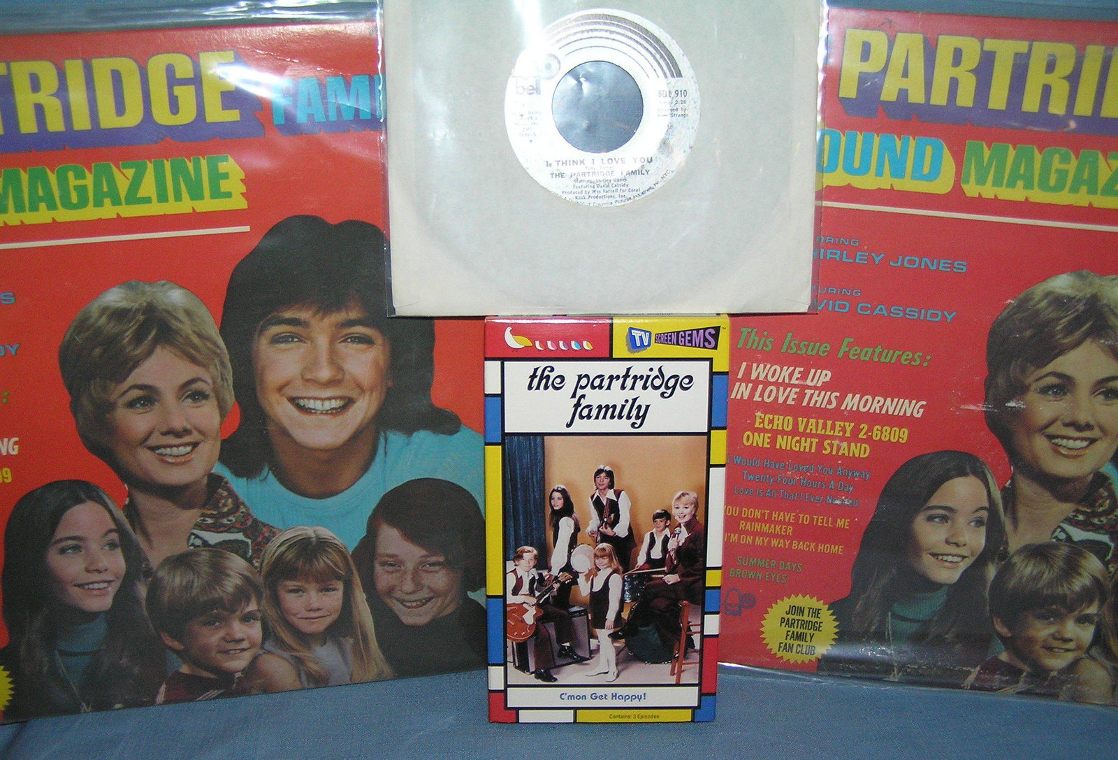 Group of Partridge Family collectibles: Group of Partridge Family collectibles includes 2 record albums, 45 RPM record and the Partridge Family C'mon Get Happy TV video est. value $65.00-$75.00