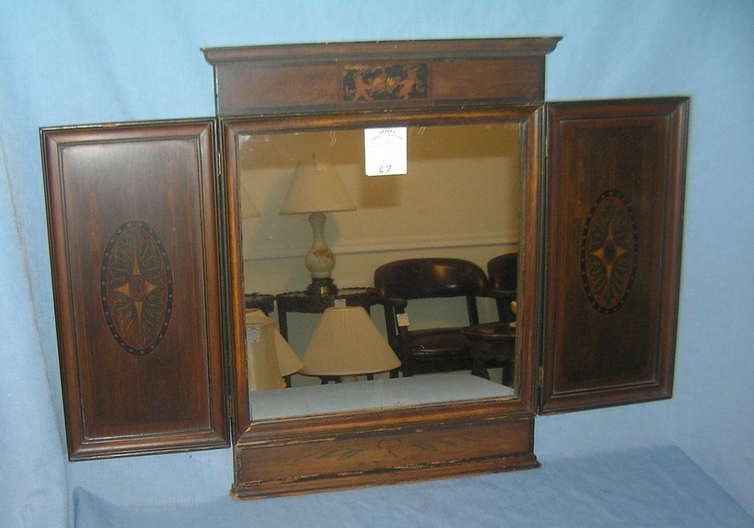 Antique mirror with fancy decoration: Antique mirror with fancy decoration est. value $150.00-$200.00