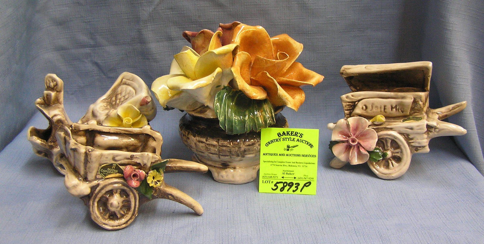 Group of 4 vintage Capodimonte pieces: Group of 4 vintage Capodimonte pieces includes flower arrangement and 3 old fashioned carts est. value $125.00-$150.00