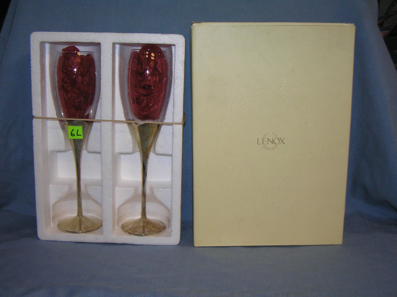 Crystal and silver champaign glass set by Lenox: Crystal and silver champaign glass set by Lenox with original box est. value $50.00-$60.00