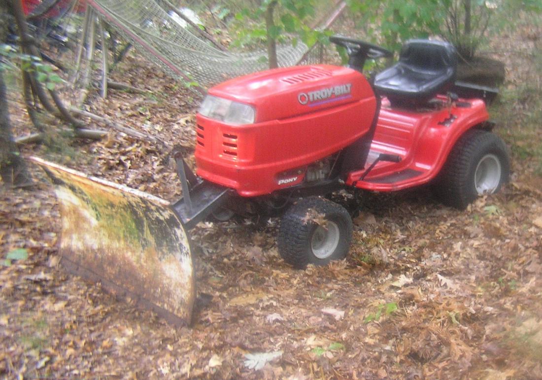 Troy bilt ride on lawn tractor: Troy bilt 17 1/2 HP ride on lawn tractor electric start with plow attachment condition as found in a local Long Island barn est. value $500.00-$800.00