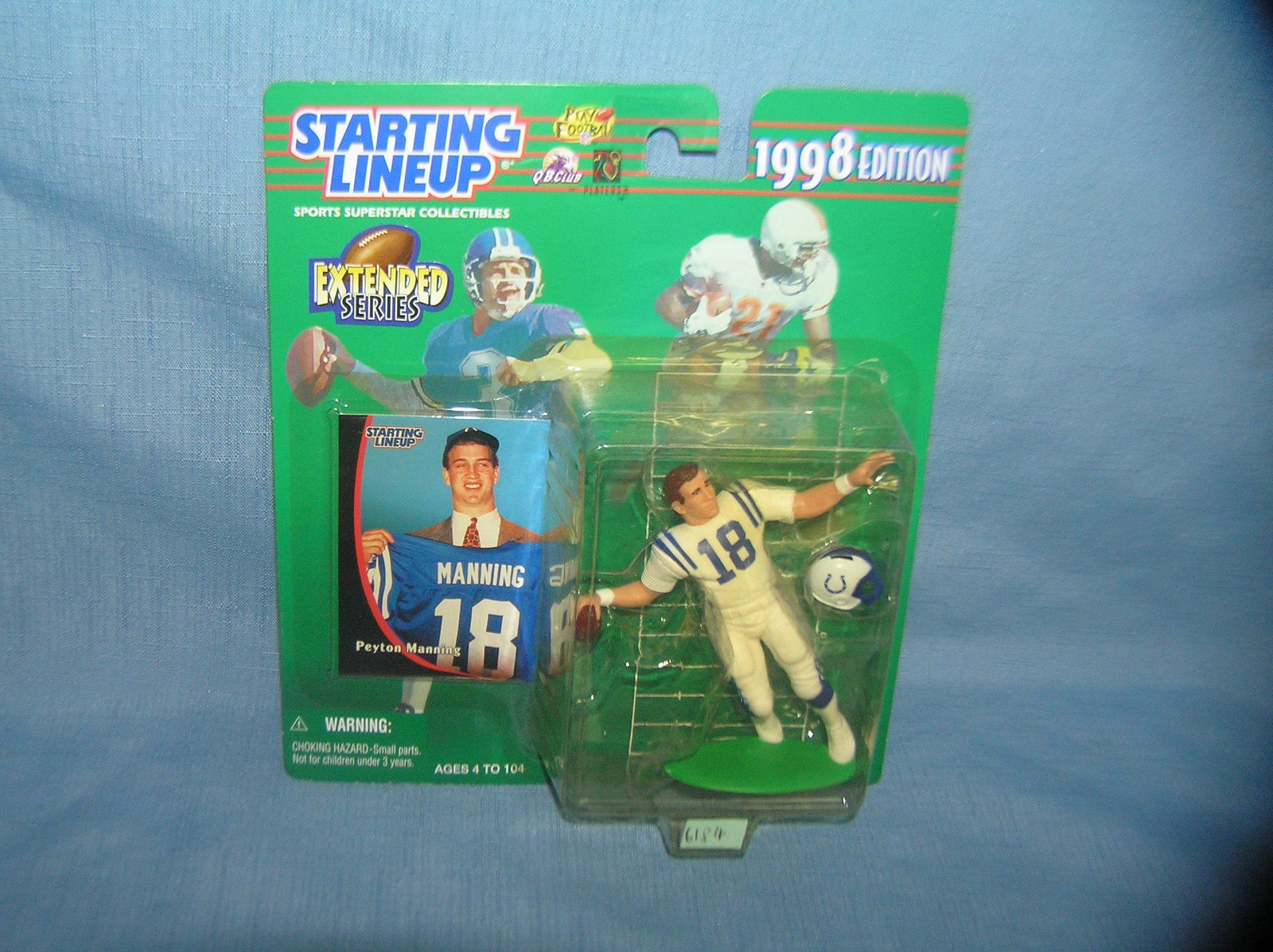 Peyton Manning football figure and sport card: Peyton Manning football figure and sport card mint on card est. value $25.00-$30.00