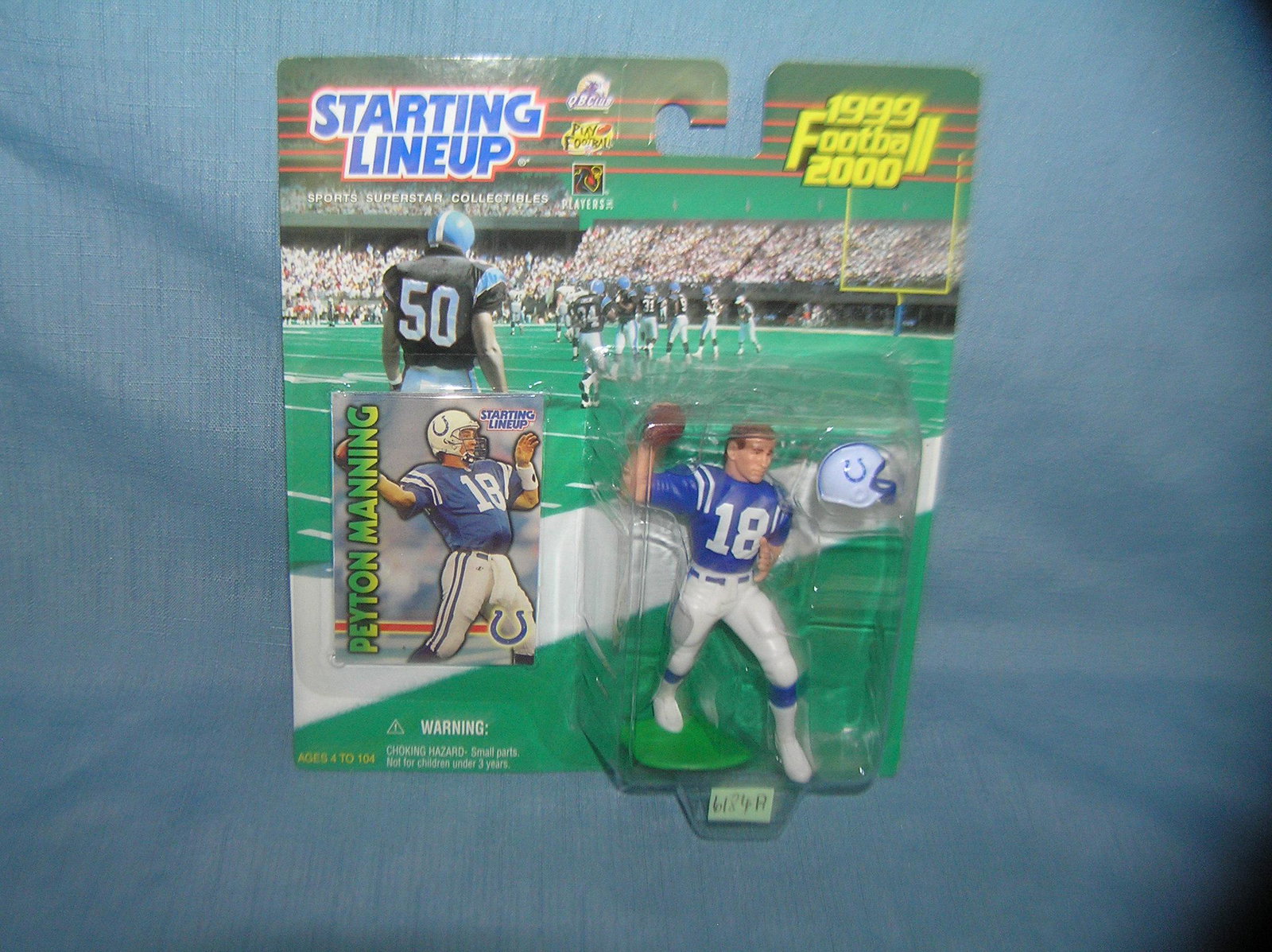 Peyton Manning football figure and sport card: Peyton Manning football figure and sport card mint on card est. value $25.00-$30.00