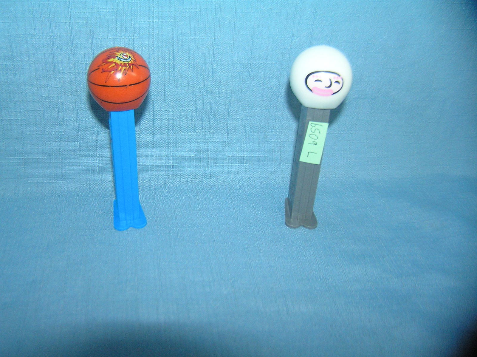 Pair of vintage PEZ Candy containers: Pair of vintage PEZ Candy containers est. value $25.00-$30.00