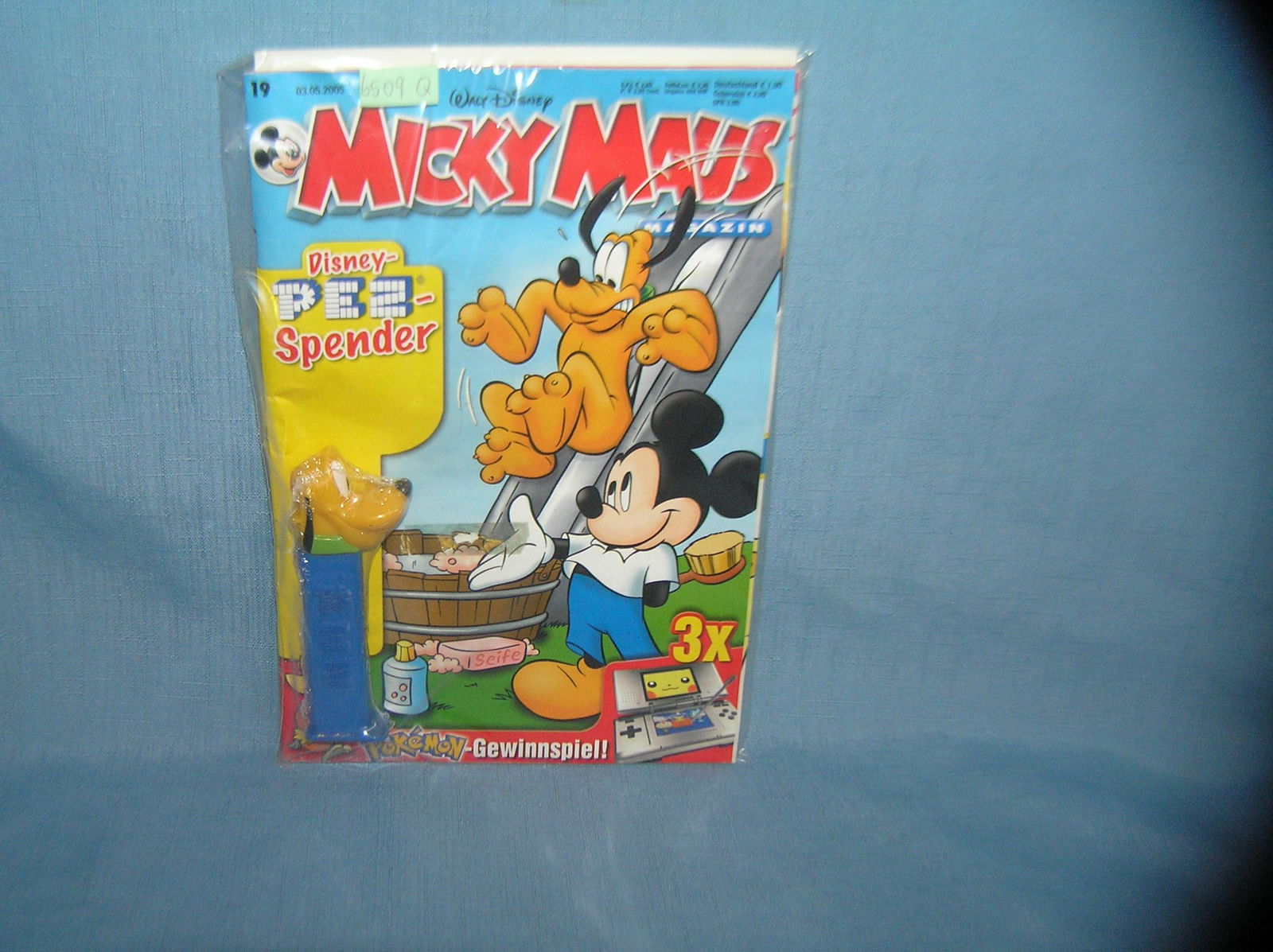 Disney Comic Book and PEZ Candy container, both mint: Disney Comic Book and PEZ Candy container, both mint est. value $30.00-$35.00