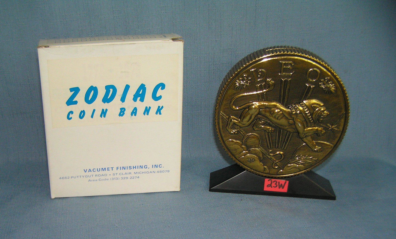 Leo all cast metal Zodiac bank with original box: Leo all cast metal Zodiac bank with original box est. value $75.00-$80.00