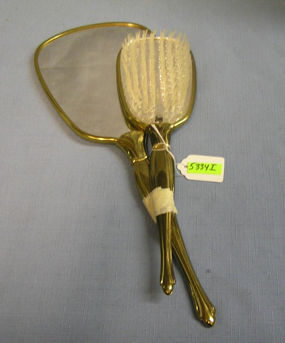 Vintage mirror and brush vanity set: Vintage mirror and brush vanity set, American made circa 1950's est, value $40.00-$50.00