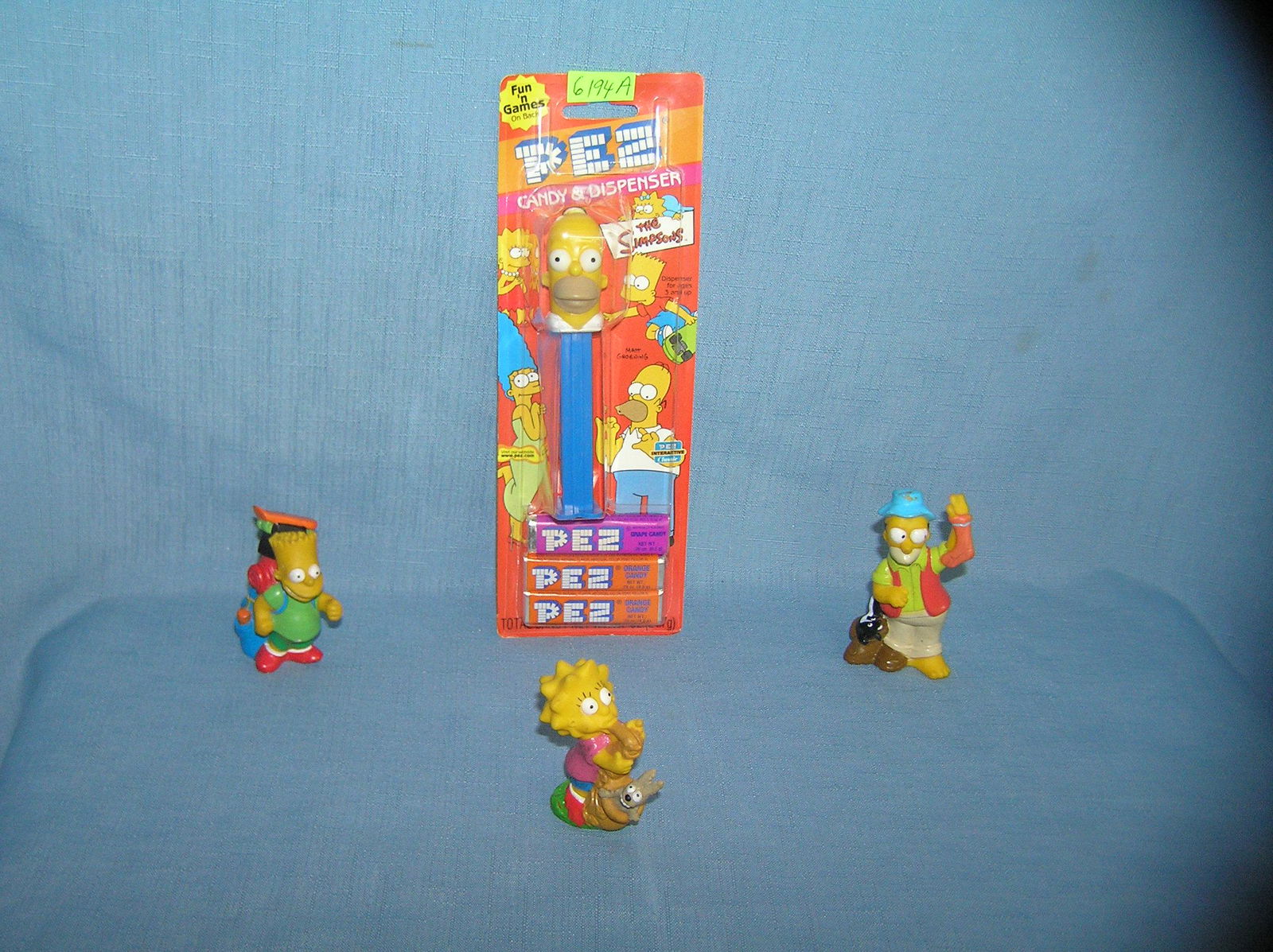 Group of vintage Simpsons PEZ candy containers: Group of vintage Simpsons PEZ collectible candy containers and collectble toys est. value $30.00-$35.00