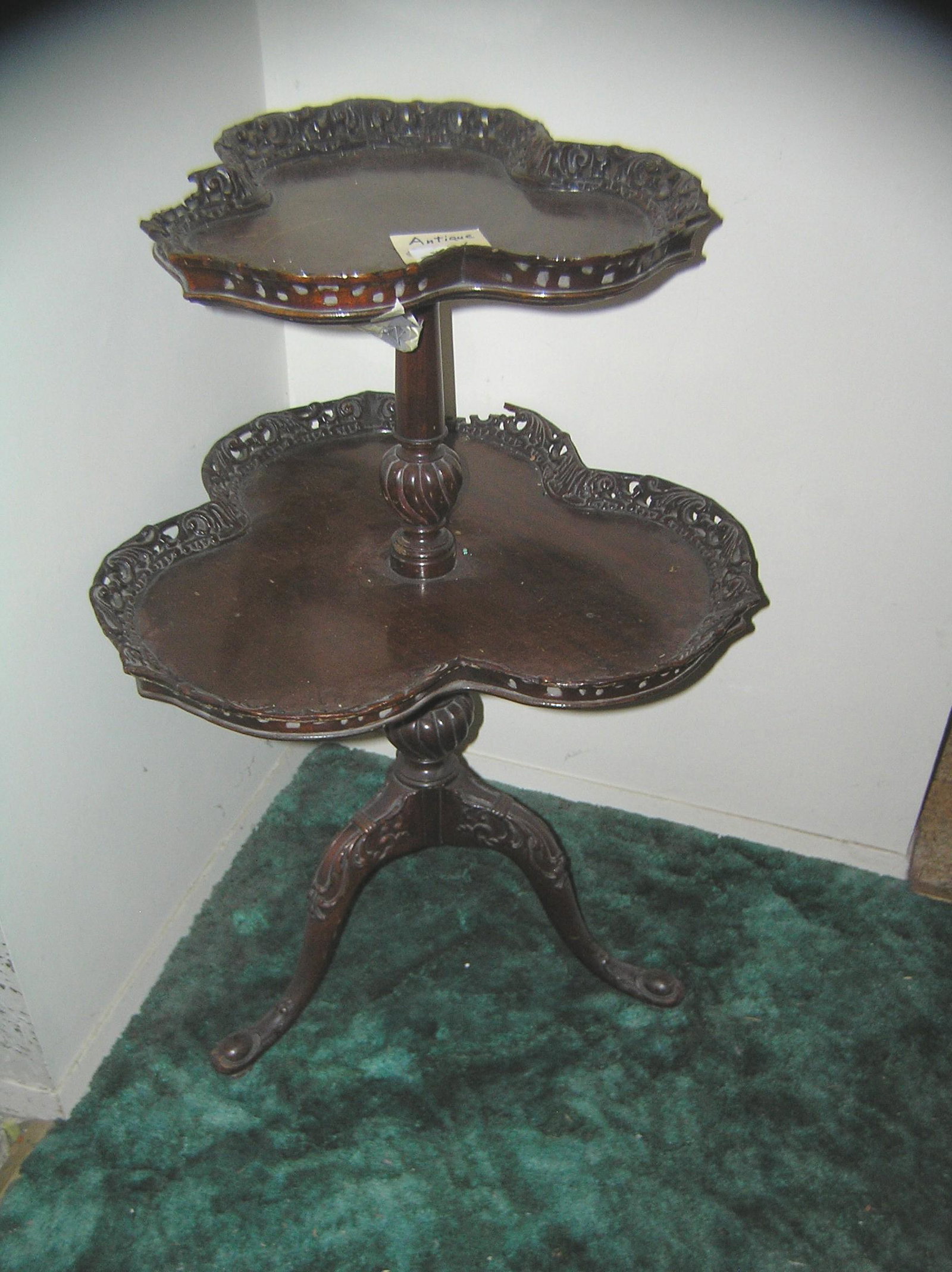 Antique 2 tiered table: Antique 2 tiered table needs some repair otherwise very nice est. value $150.00-$200.00