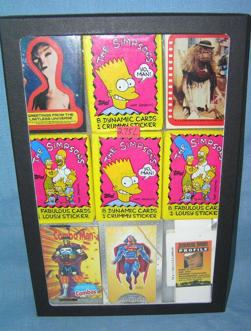 Group of vintage unopened packs and card sets: Group of vintage unopened packs and card sets featuring the Simpsons, Aliens, ET, Jurassic Park, Superman and Comboman est. value $50.00-$60.00