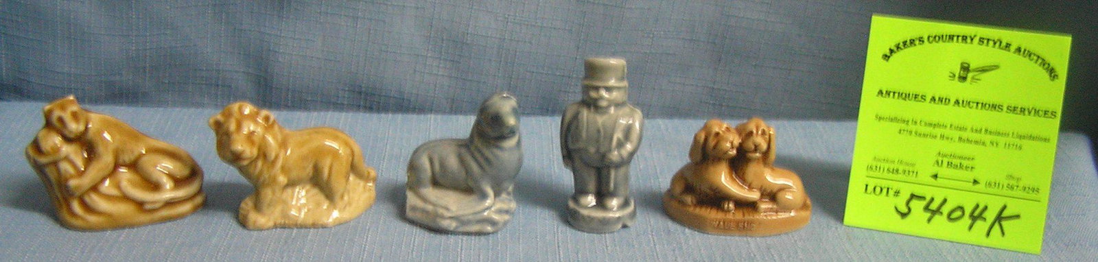 Figures and animals by Wade of England: Group of vintage figures and animals by Wade of England est. value $40.00-$50.00