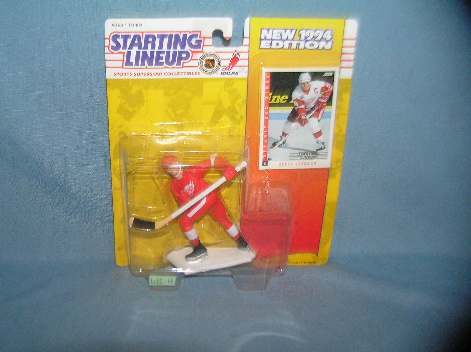 Steve Yzerman hockey figure and sport card: Steve Yzerman hockey figure and sport card mint on card est. value $25.00-$30.00