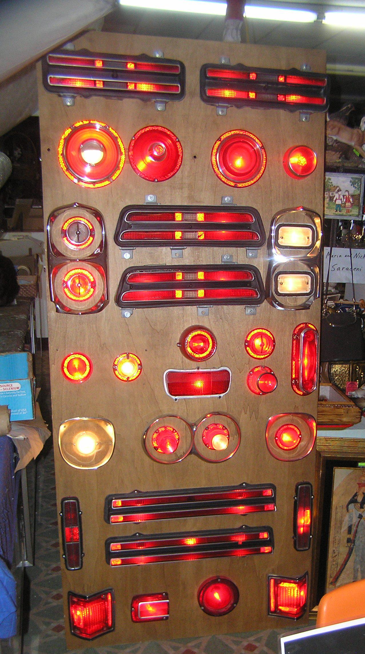 Vintage illuminated automotive light diorama display: Vintage illuminated automotive light diorama display piece 1955 to 1971 36 all mounted pieces.This electrified and illuminated diorama consists of Firebird, Thunder bird, Galaxy, Falcon, Fury, Impala,