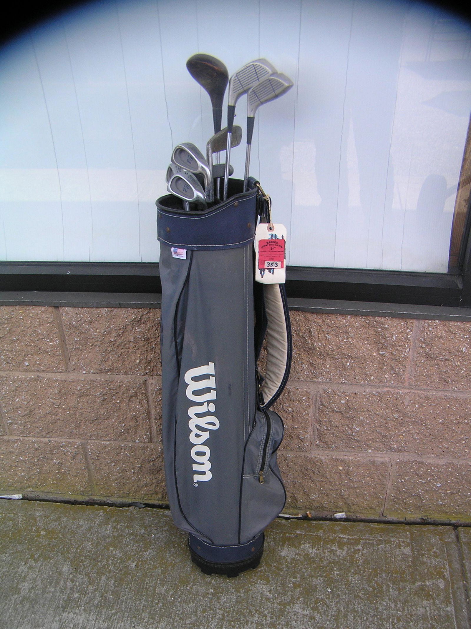 Golf club set includes a Wilson bag, Northwestern irons: Golf club set includes a Wilson bag, Northwestern irons and putter 1 and 3 woods anplus an additional wood driver est. value $50.00-$75.00 customer pick up only on this item